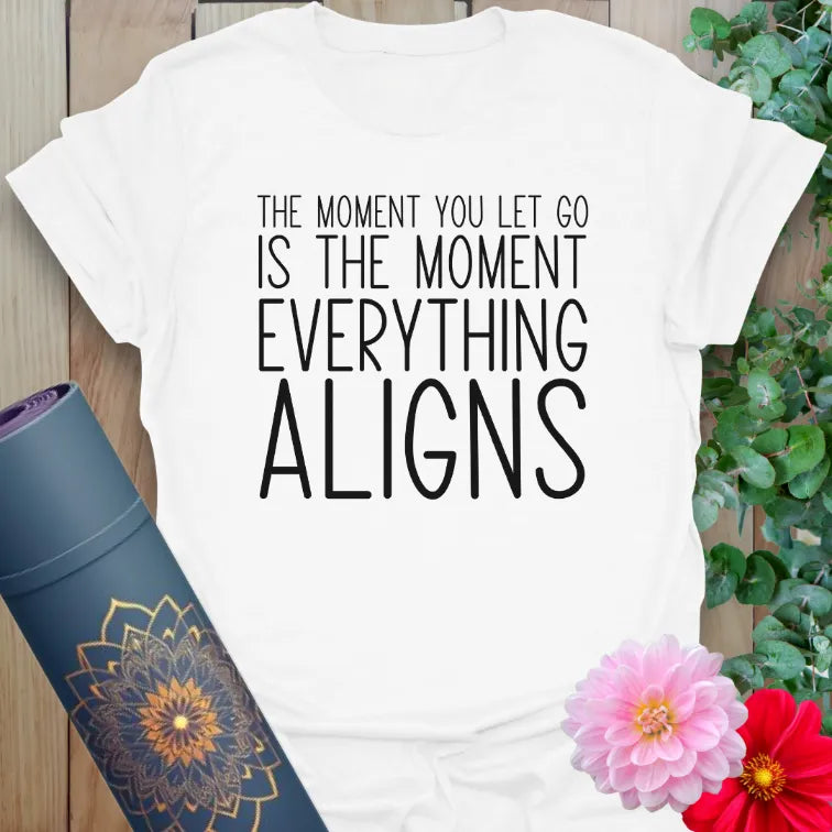 Clean white unisex yoga t-shirt featuring uplifting alignment affirmation for heart-centered, soulful daily inspiration.