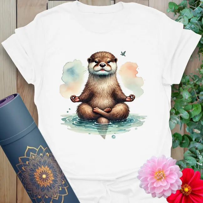 Clean white unisex yoga t-shirt showcasing serene otter meditating on water, symbolizing mindful joy and playful soulfulness.