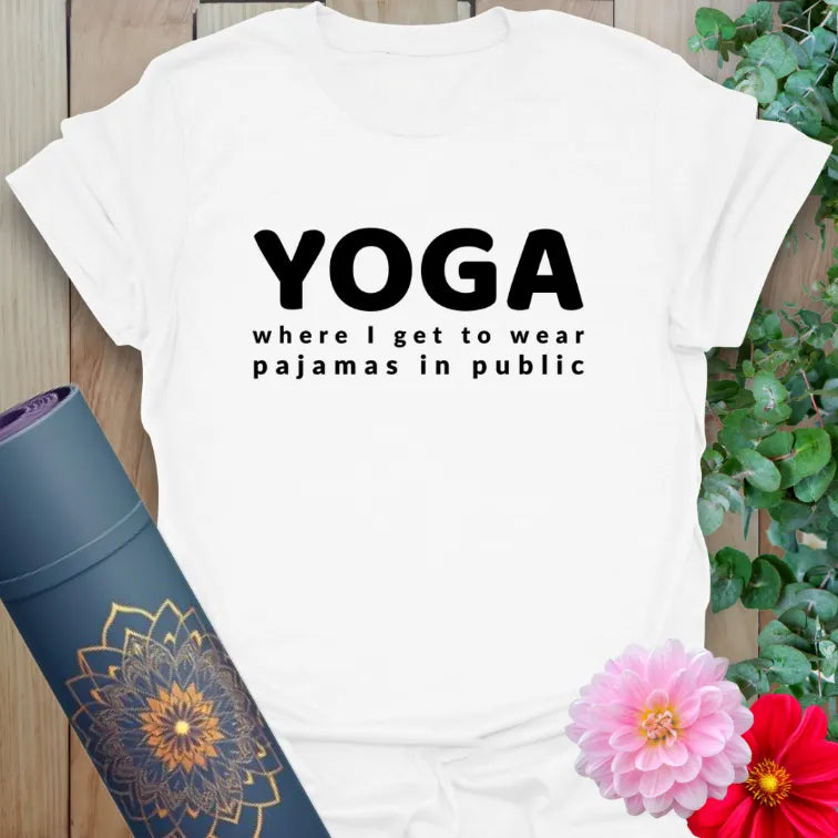 Clean white unisex yoga t-shirt showcasing cozy yoga humor quote for comfort-loving mindful movers.