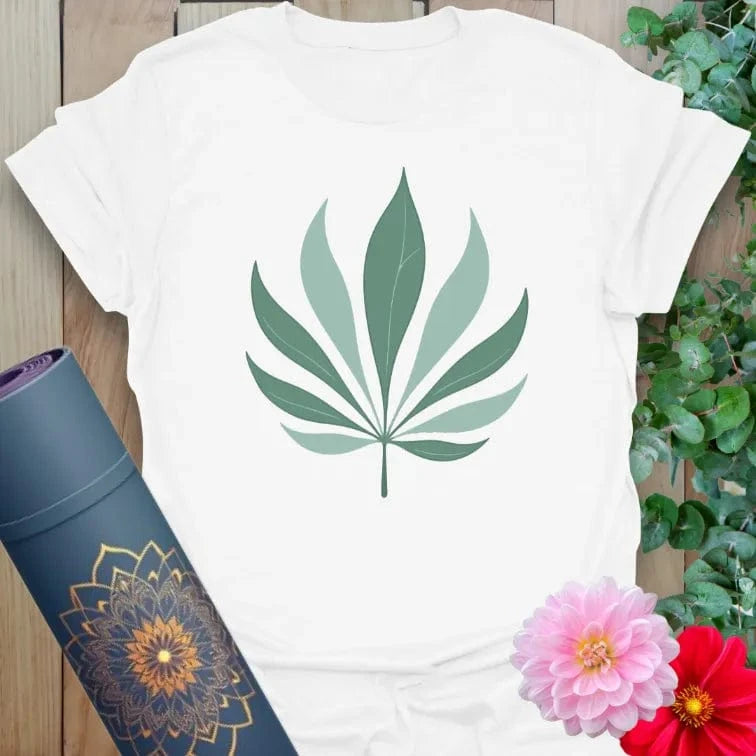 Clean white unisex yoga t-shirt featuring minimalist palm leaf artwork for conscious, nature-connected mindful living.