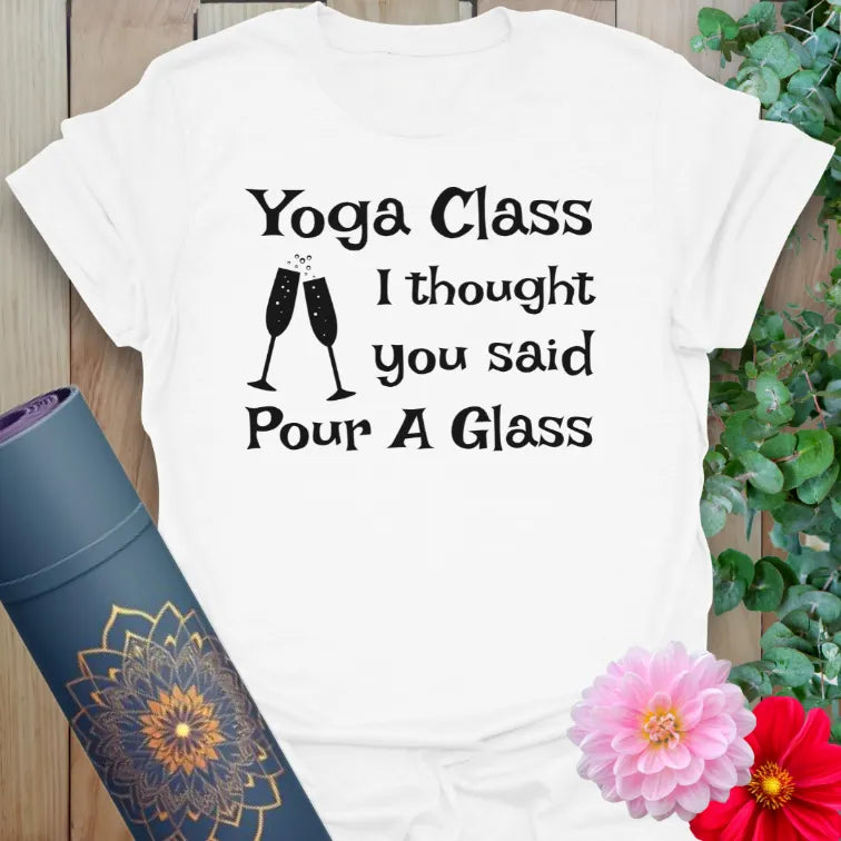 Clean white unisex yoga t-shirt with playful wine and yoga humor inspiring light-hearted mindful living and conscious celebration.