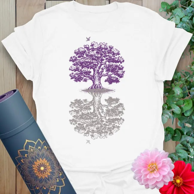 Clean white unisex yoga t-shirt featuring intricate mirrored tree artwork inspiring grounded, mindful, soulful living.