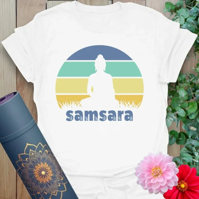 Clean white unisex yoga t-shirt featuring colorful sunset and meditating figure inspiring mindful awareness of life's sacred cycles.