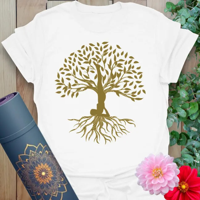 Clean white unisex yoga t-shirt featuring yogi shoulder stand turning into tree artwork symbolizing mindful roots and spiritual growth.