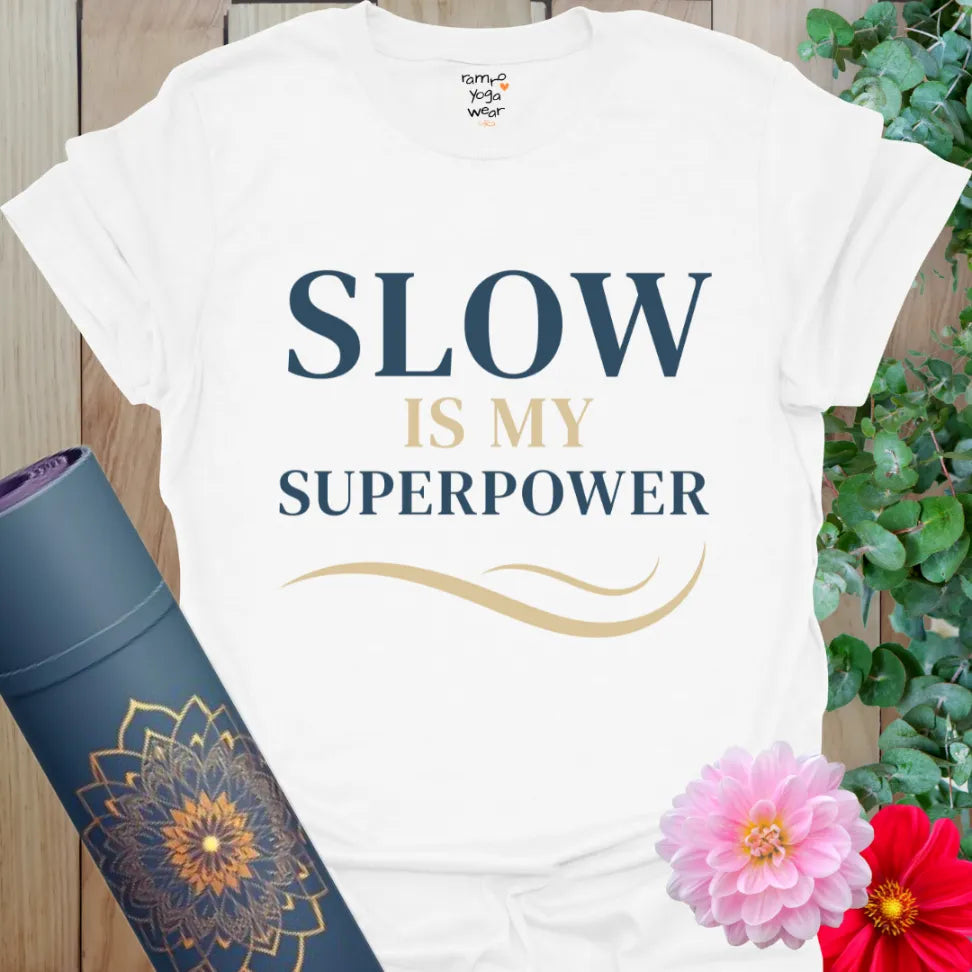 White Slow T-Shirt with elegant layout and cream-colored swirl. A calm statement piece for yoga and street style wear.