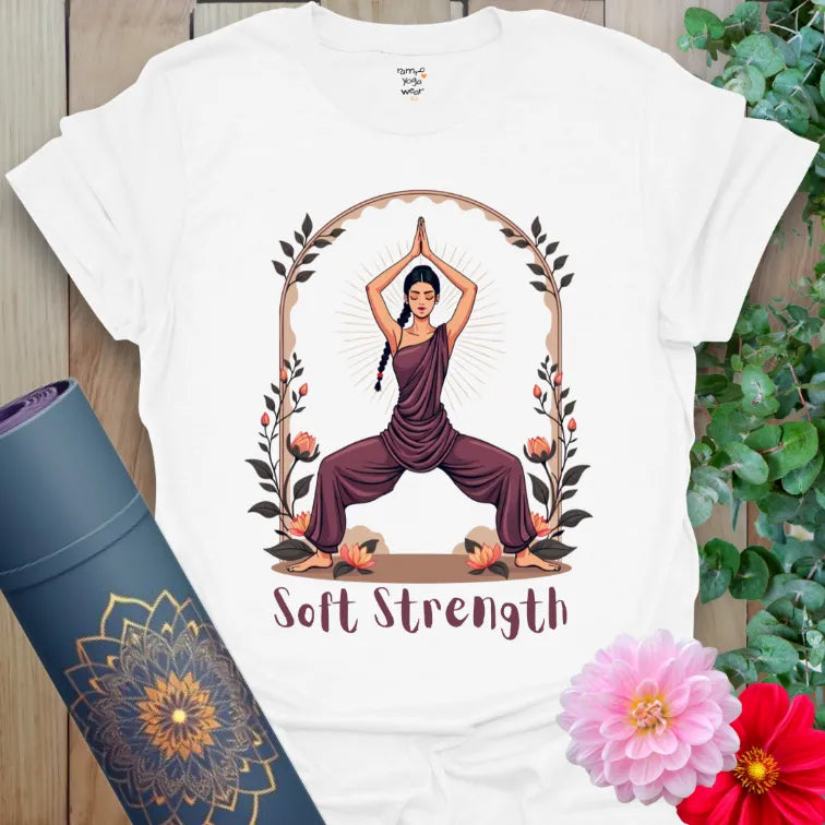Clean white unisex yoga t-shirt featuring soft, strong Goddess pose art and botanical arch for soulful, heart-led living.