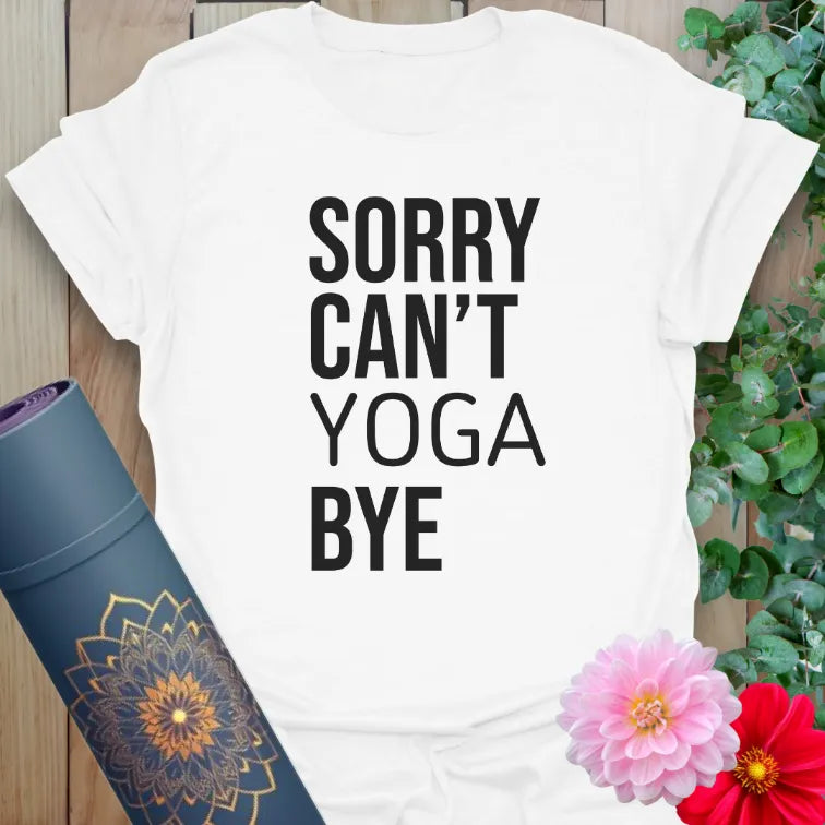 Clean white unisex yoga t-shirt with bold yoga quote showcasing playful priority-setting and yogi humor.