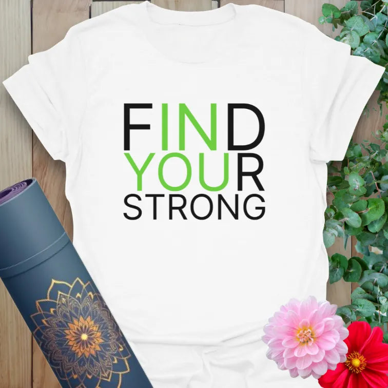 Clean white unisex yoga t-shirt with modern black and green lettering saying “FIND YOUR STRONG,” ideal for powerful presence.
