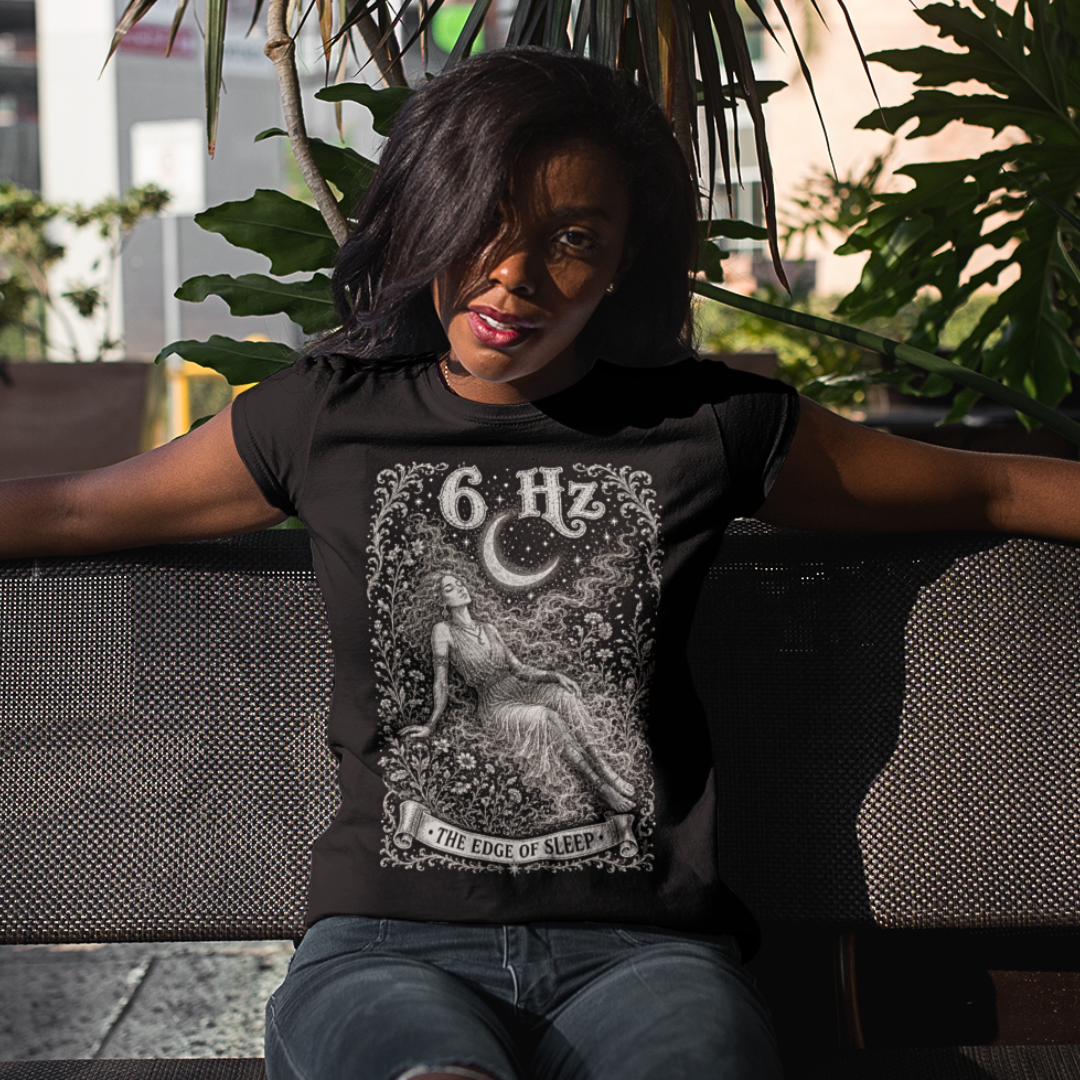 6 Hz T-Shirt black sacred yoga shirt outdoors among plants — Dark Sacred Stillness collection by Ramro Yoga Wear
