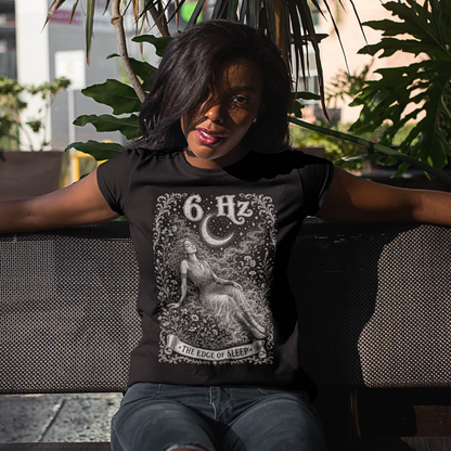 6 Hz T-Shirt black sacred yoga shirt outdoors among plants — Dark Sacred Stillness collection by Ramro Yoga Wear