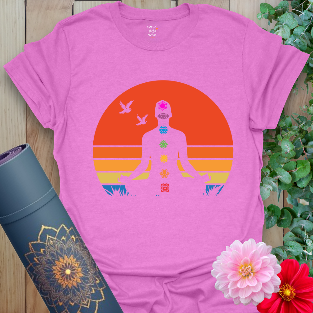 Flatlay of radiant orchid purple 7 Chakra T-Shirt with meditative chakra artwork and energy-inspired colors.