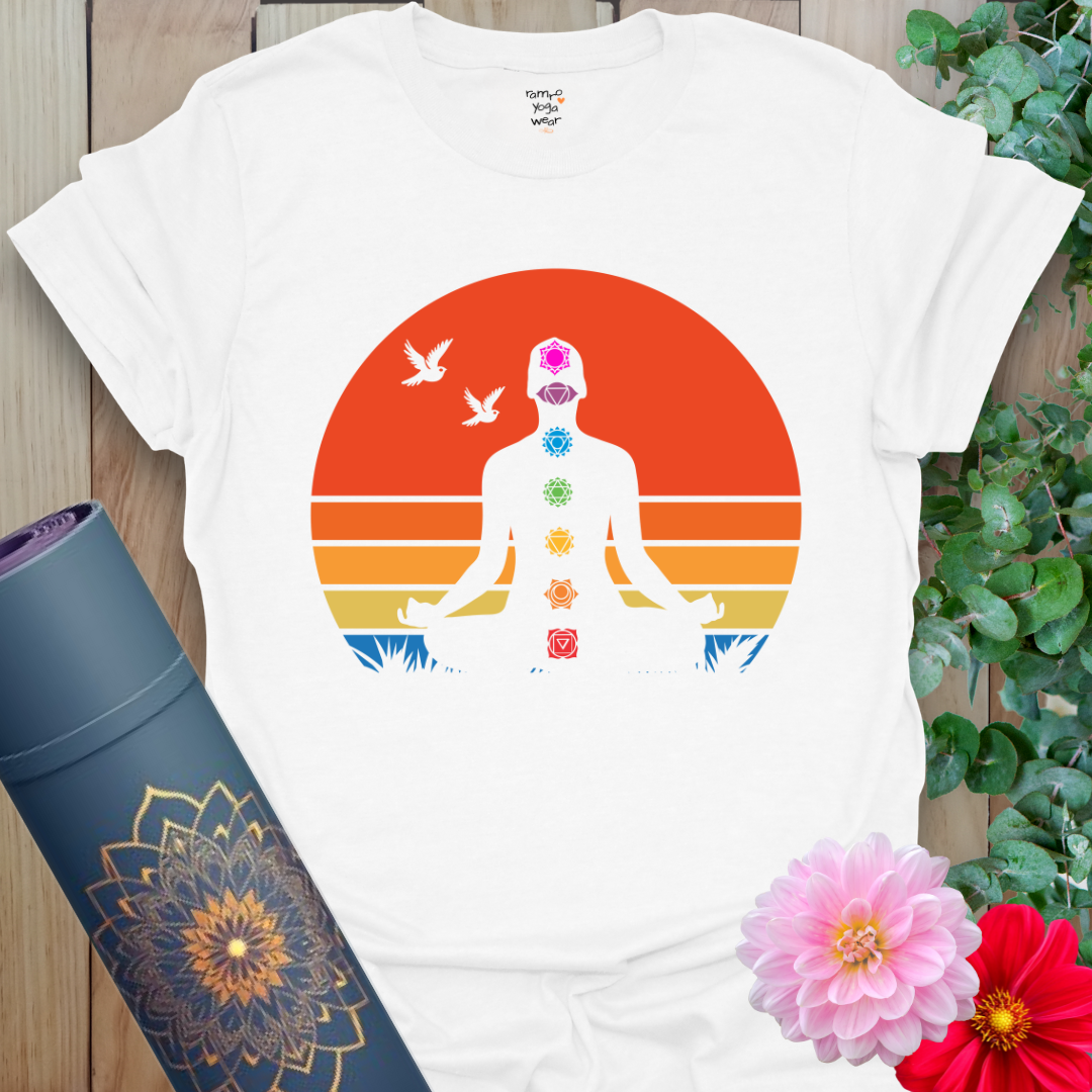 Flatlay of white 7 Chakra T-Shirt with bold chakra artwork, perfect for mindful living.