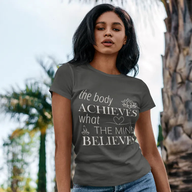 Woman wearing Achieve T-Shirt Heather Military Green standing against a plain wall by Ramro Yoga Wear from the Vault Collection