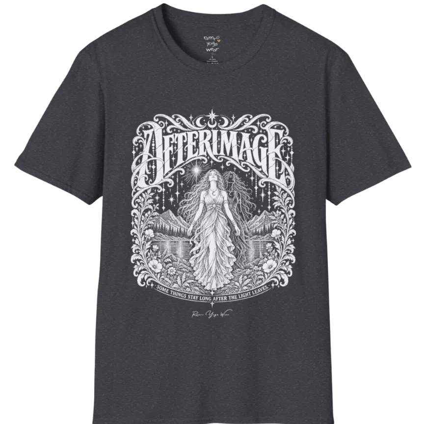 A short sleeved tee called the Afterimage T-Shirt, flat lay and a Gildan 64000 shirt on a white background. Simply says, Some Things Stay Long After The Light Leaves. Design highlights a long-haired figure in a flowing gown standing before a faint ghosted double of herself, under a starry sky with mountains, a lake and an ornate floral frame. Color is Dark Heather Grey.