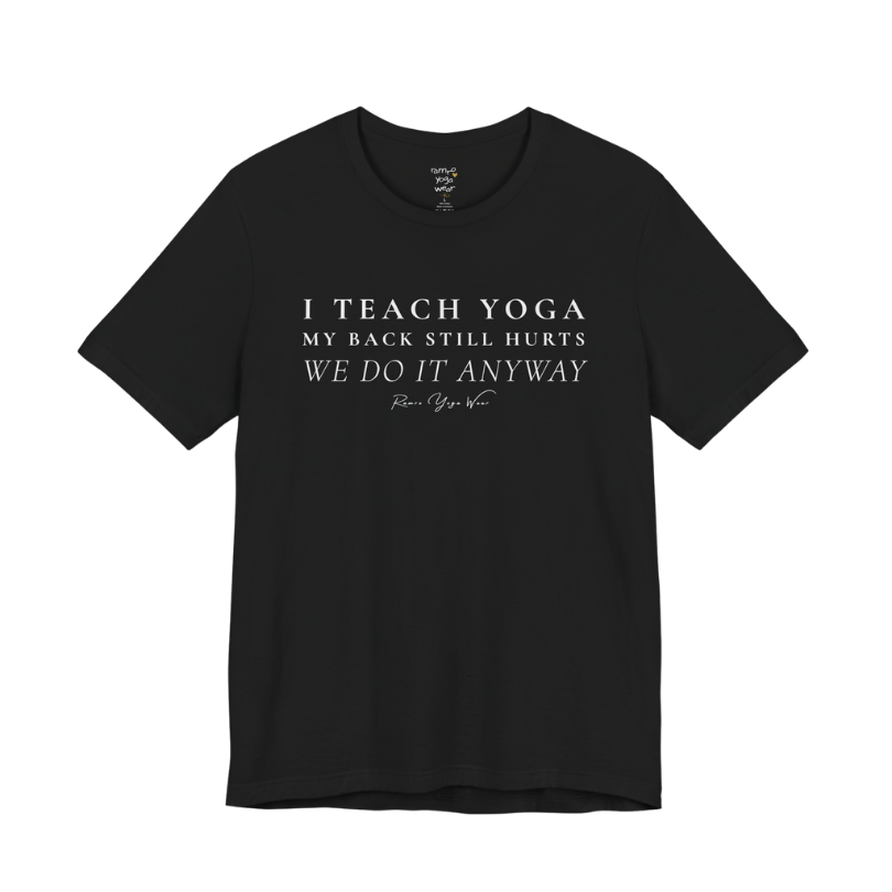 I TEACH YOGA MY BACK STILL HURTS WE DO IT ANYWAY yoga teacher gift tee flat lay in Black — Yoga Teacher Gifts collection by Ramro Yoga Wear