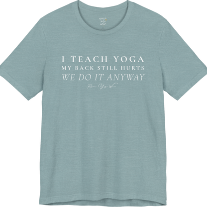 I TEACH YOGA MY BACK STILL HURTS WE DO IT ANYWAY yoga teacher gift tee flat lay in Heather Blue Lagoon — Yoga Teacher Gifts collection by Ramro Yoga Wear