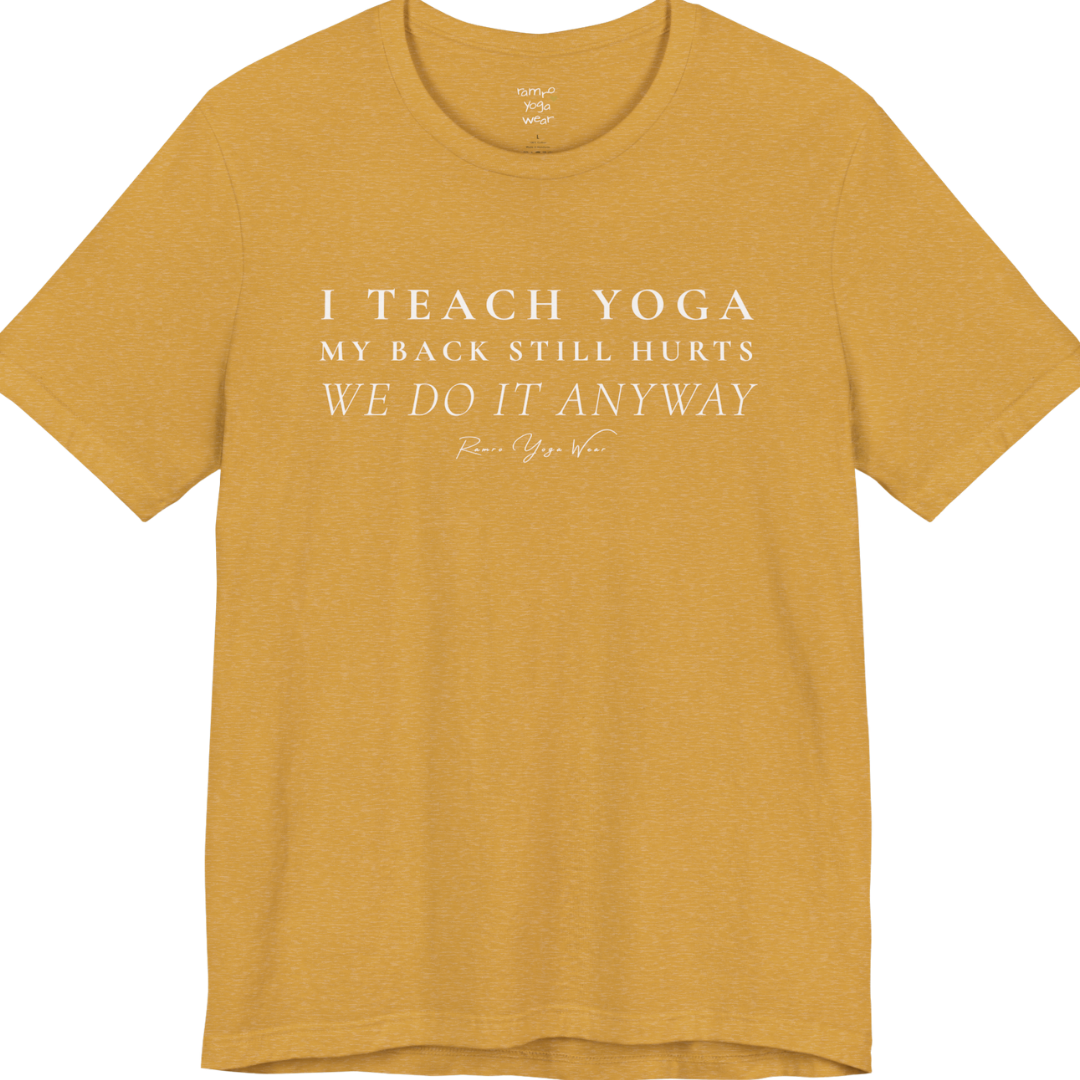 I TEACH YOGA MY BACK STILL HURTS WE DO IT ANYWAY yoga teacher gift tee flat lay in Heather Mustard — Yoga Teacher Gifts collection by Ramro Yoga Wear