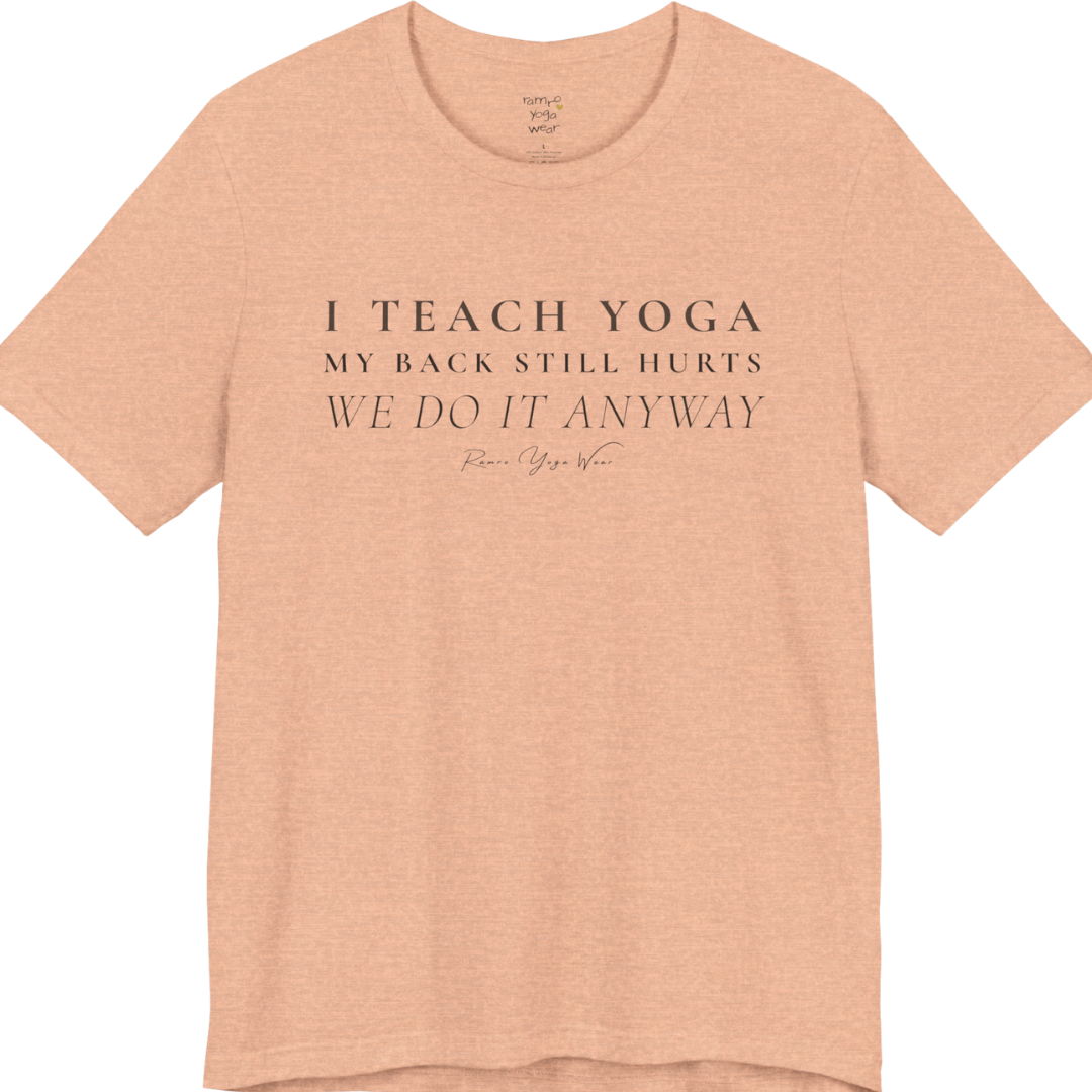 I TEACH YOGA MY BACK STILL HURTS WE DO IT ANYWAY yoga teacher gift tee flat lay in Heather Peach — Yoga Teacher Gifts collection by Ramro Yoga Wear