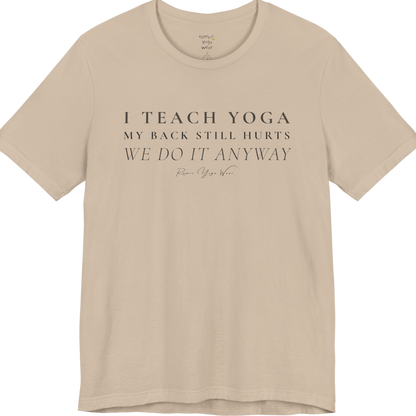 I TEACH YOGA MY BACK STILL HURTS WE DO IT ANYWAY yoga teacher gift tee flat lay in Tan — Yoga Teacher Gifts collection by Ramro Yoga Wear