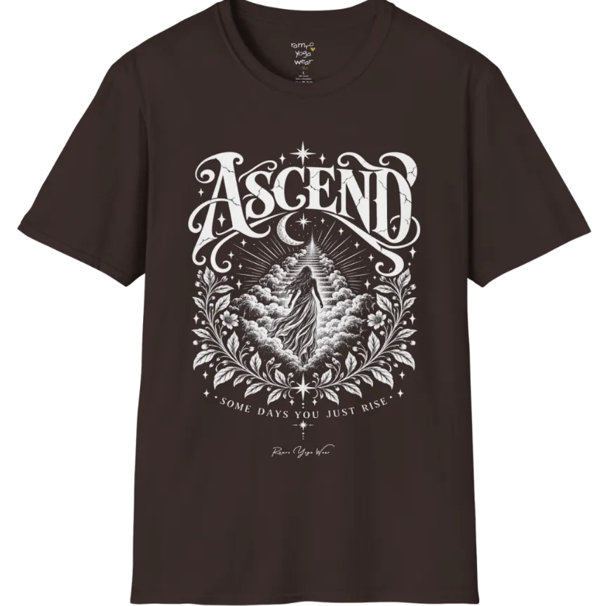 A short sleeved Tee with a figure rising through layered clouds toward a staircase of light, framed by a diamond-shaped botanical border with stars and a crescent moon above. Ascend T-Shirt flat lay is a Gildan 64000 and the color is Dark Chocolate.