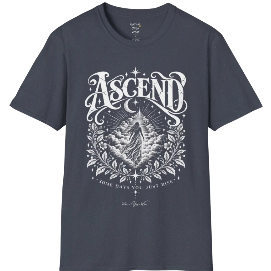 A short sleeved Tee with a figure rising through layered clouds toward a staircase of light, framed by a diamond-shaped botanical border with stars and a crescent moon above. Ascend T-Shirt flat lay is a Gildan 64000 and the color is Heather Navy.