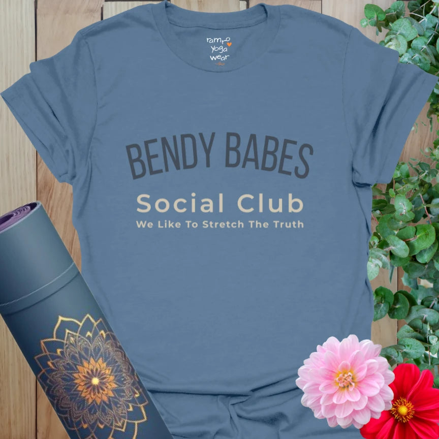 Indigo Blue Bendy Babes Social Club Tee with cheeky stretch humor. Relaxed fit yoga shirt.