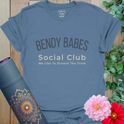 Indigo Blue Bendy Babes Social Club Tee with cheeky stretch humor. Relaxed fit yoga shirt.