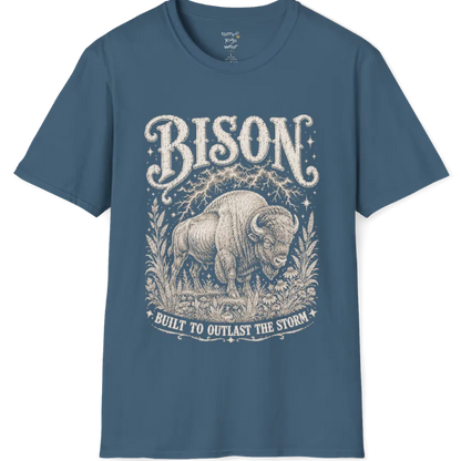 A short sleeved grunge tee with an illustrated bison design, botanical linework framing the scene, text reading "Bison" and "Built To Outlast The Storm" — Wild Animals collection by Ramro Yoga Wear in Indigo Blue.