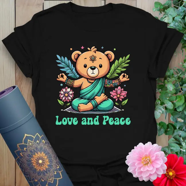 Black yoga t-shirt with colorful meditating bear and “Love and Peace” message
