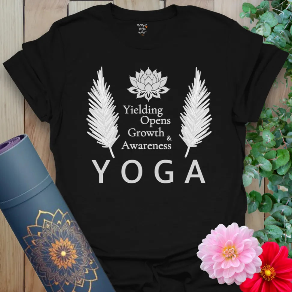 Black yoga shirt with lotus, palms, and yoga acronym for growth and awareness