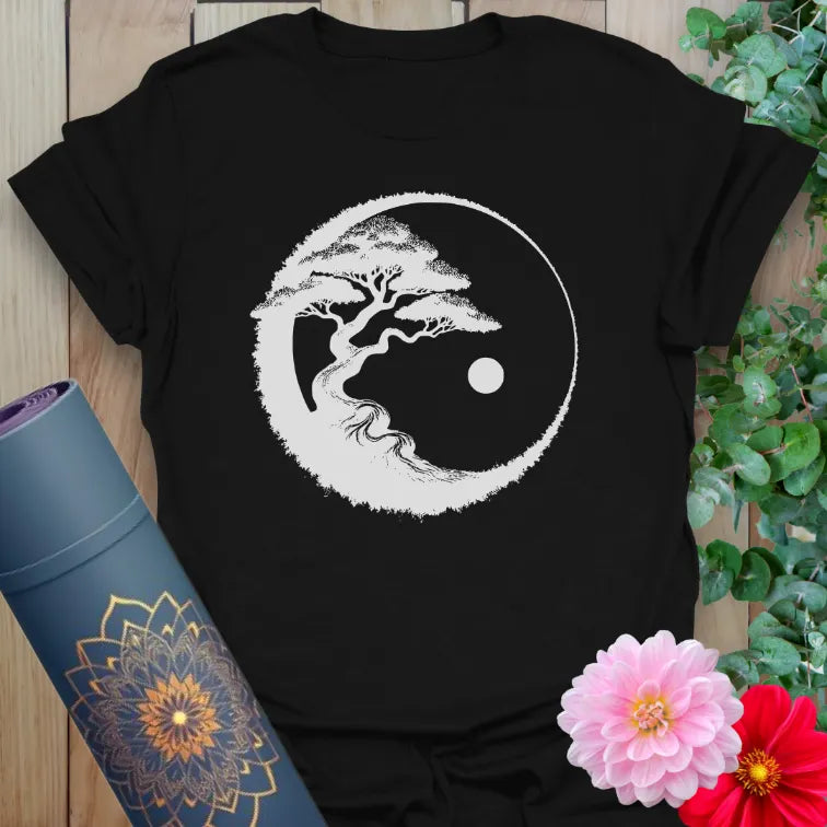 Black yoga t-shirt with minimalist white bonsai tree and yin-yang design