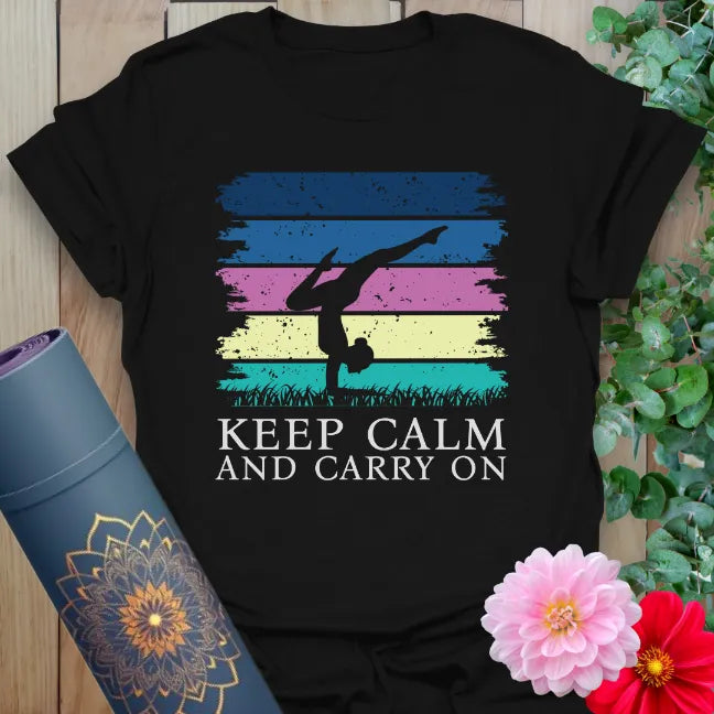 Black yoga t-shirt with colorful brushstroke design and handstand graphic