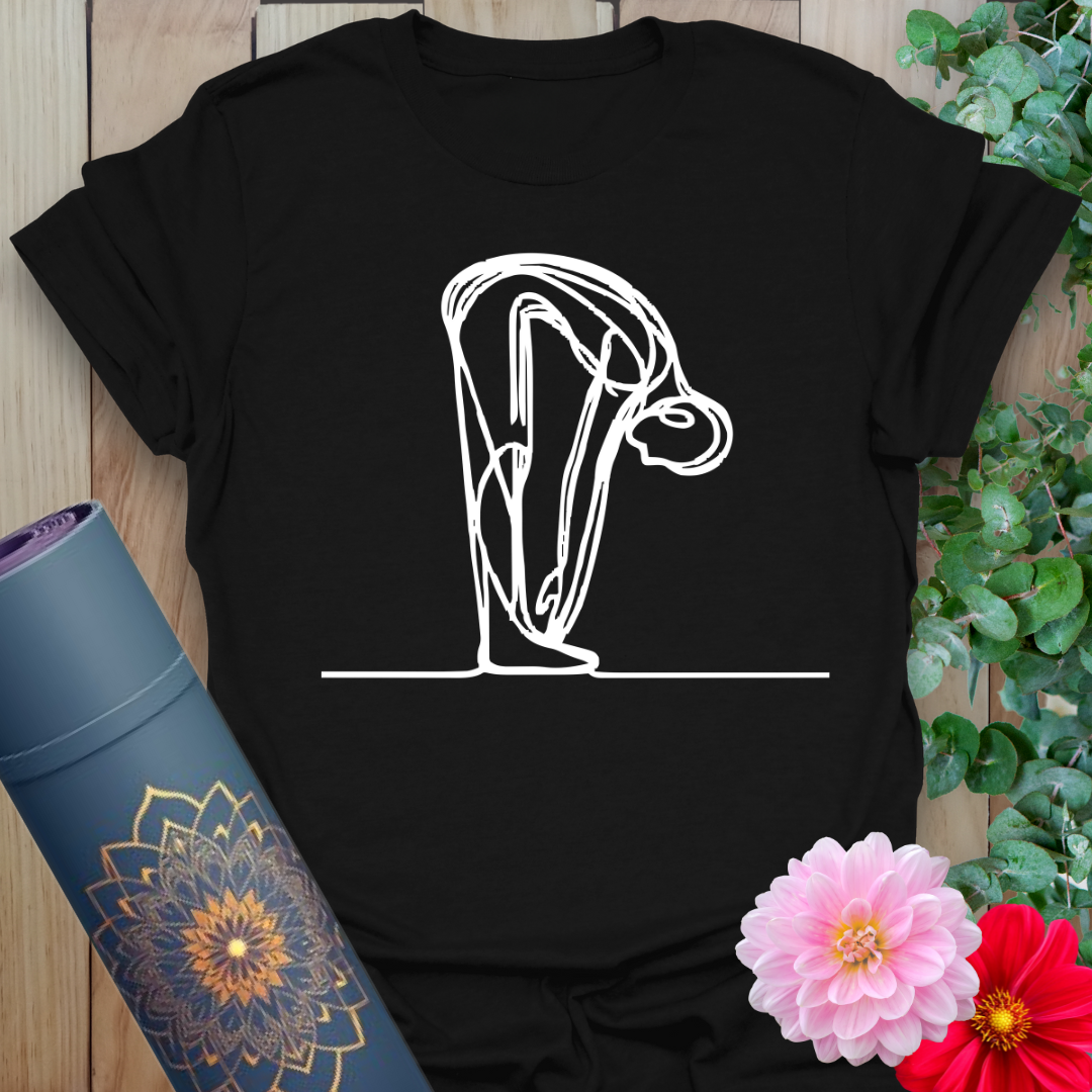 Classic black cotton yoga t-shirt with serene forward fold artwork symbolizing surrender, strength, and soulful living.