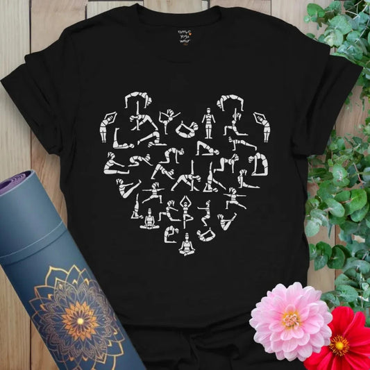 Classic black cotton yoga t-shirt showcasing yoga poses arranged into a heart symbol for conscious, love-led living.