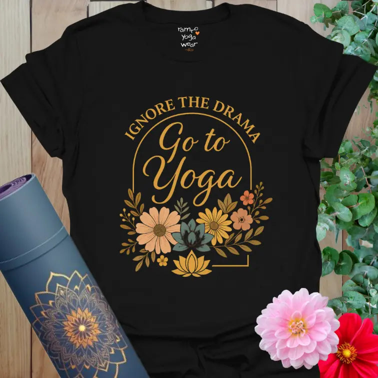 Vintage floral arch paired with elegant gold-toned yoga script on a classic black tee for a bold, stylish look.