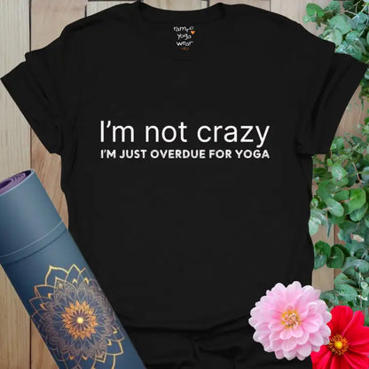 Black Im Not Crazy T-Shirt with clean white text. A statement tee for yogis who find their sanity one savasana at a time.