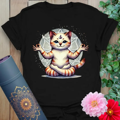 Classic black cotton yoga t-shirt featuring soulful meditating cat and geometric backdrop symbolizing mindful balance and playful energy.