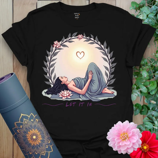 Classic black cotton yoga t-shirt showcasing serene yogi in peaceful heart opener with glowing sun and love heart design.