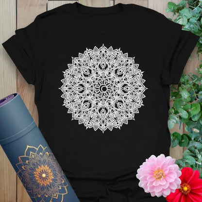 Classic black cotton yoga t-shirt showcasing detailed mandala artwork symbolizing sacred geometry, balance, and conscious flow.