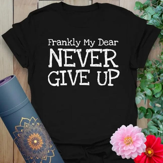Classic black cotton yoga t-shirt showcasing bold motivational lettering perfect for mindful strength and heart-led perseverance.