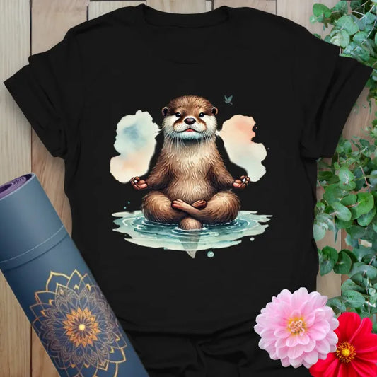 Classic black cotton yoga t-shirt with playful otter meditation design, blending humor, soul, and mindful movement.