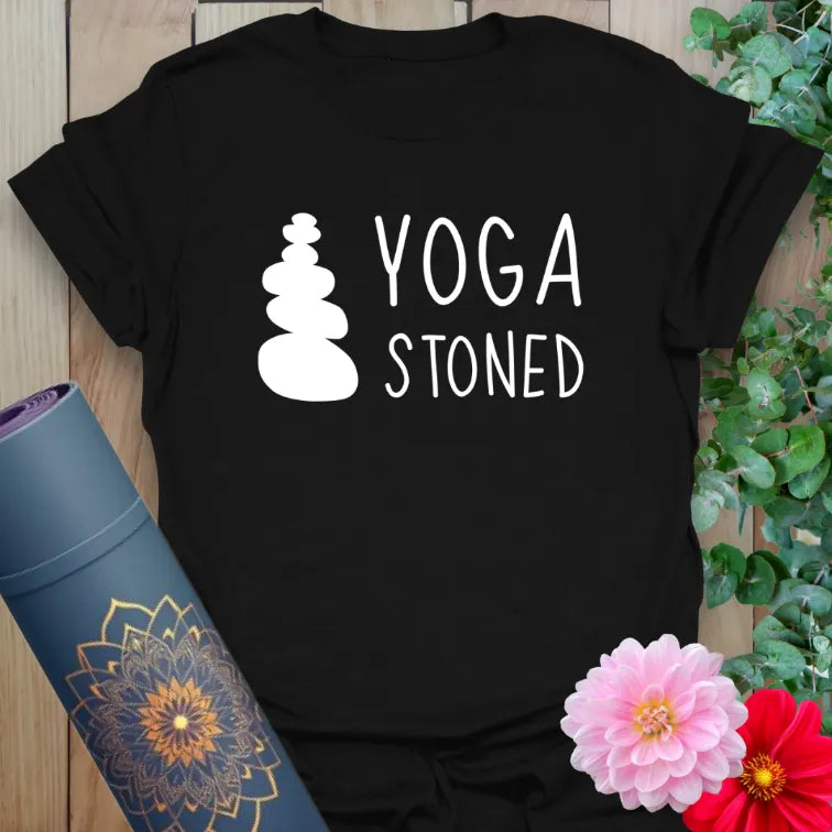 Classic black cotton tee with bold white “YOGA STONED” graphic and zen stone stack for funny spiritual streetwear.