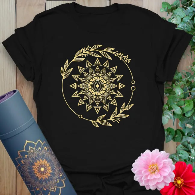 Classic black cotton tee with bold gold sacred sun and foliage design for a mystical, grounded yoga streetwear look.