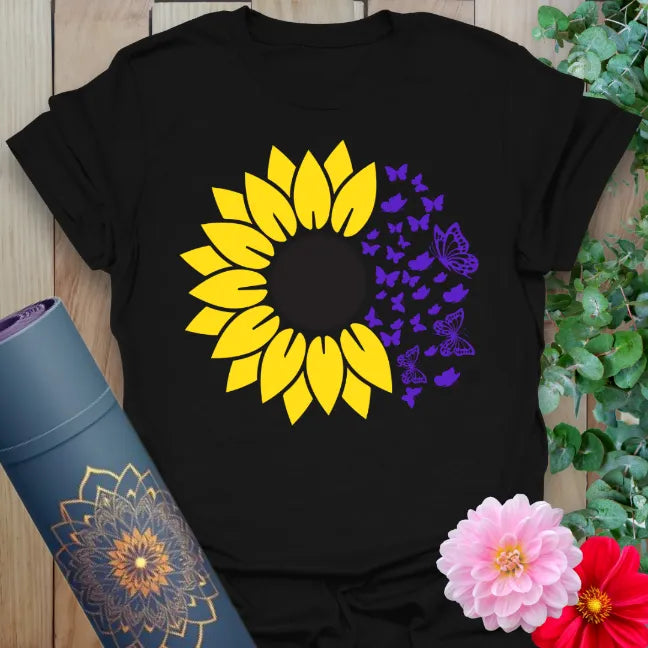Classic black cotton t-shirt with bold sunflower graphic and purple butterflies for spiritual, eye-catching yoga streetwear.