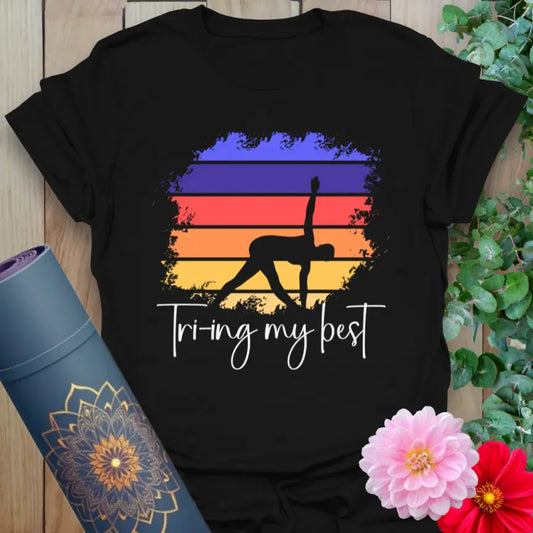 Classic black cotton t-shirt with sunset stripe graphic and humorous yoga affirmation for bold, grounded living.