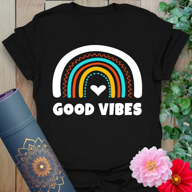 Classic black cotton tee with bright rainbow design and “Good Vibes” message for bold, joyful lifestyle energy.