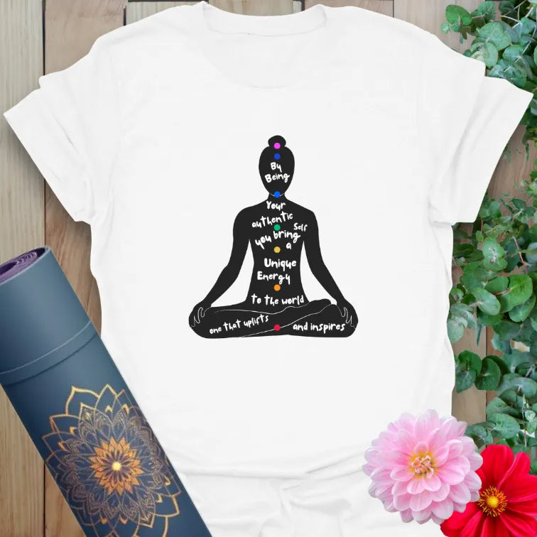 White unisex tee with yoga affirmation design and meditative silhouette