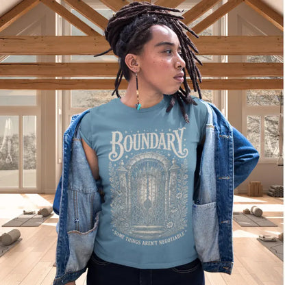 Person wearing Boundary tee color indigo blue sacred yoga shirt in a sunlit yoga studio — Sacred Thread collection by Ramro Yoga Wear