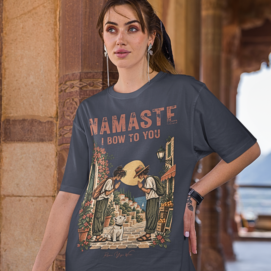 A woman wearing the short sleeved Bow T-Shirt in Heather Midnight Navy, standing in a stone archway — Funny Yoga Shirts collection by Ramro Yoga Wear