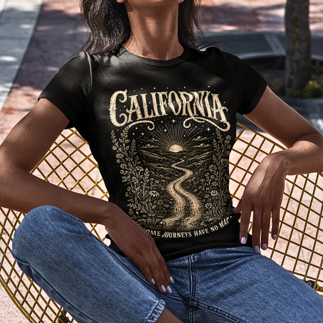 Person wearing a short sleeved tee called California in black. A sacred yoga shirt outdoors on a patio with palm trees — Sacred Thread collection by Ramro Yoga Wear